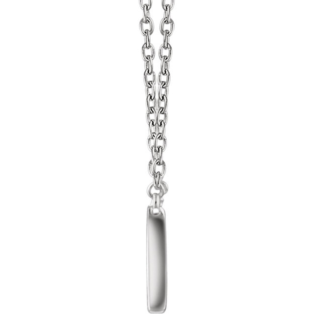 This trendy pendant features a 14k gold rectangle bar that is 7.40mm in length and 29.15mm in width. Pendant is displayed on a 16- 18inch 14k gold cable chain.