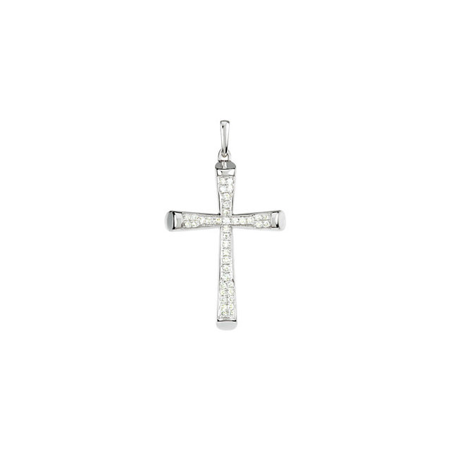 As dazzling and brilliant as your faith this sleek and simple cross is fashioned of micro pave with sparkling round diamond accents. Simple meaningful and dazzling with diamonds this cross pendant has it all. Fashioned in 14K white gold this traditional design is beautifully set with shimmering white diamonds. Radiant with 1/4 ct. t.w. of diamonds and polished to a brilliant shine.