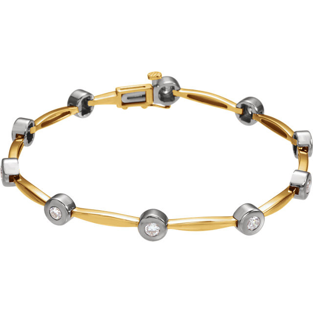Simple and brilliant, this classic tennis bracelet features 10 round, brilliant diamonds set in 14k yellow/White gold.