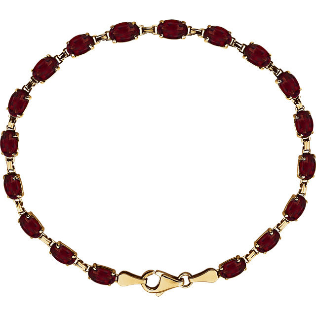 Brilliant oval genuine mozambique garnet's 6x4mm are set in 14k yellow gold in this eye-catching bracelet.