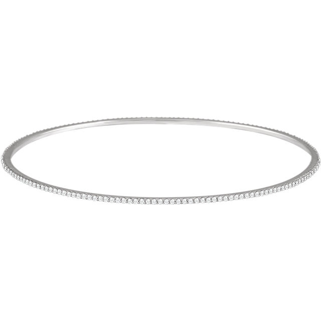 Elegant 14Kt white gold diamond bangle bracelet featuring a sparkling display of white round diamonds. Total weight of the diamonds is 1.00cts. Total weight of the gold is 5.75 grams.