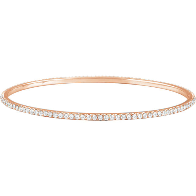 Elegant 14Kt rose gold diamond bangle bracelet featuring a sparkling display of white round diamonds. Total weight of the diamonds is 3.00cts. Total weight of the gold is 9.05 grams.