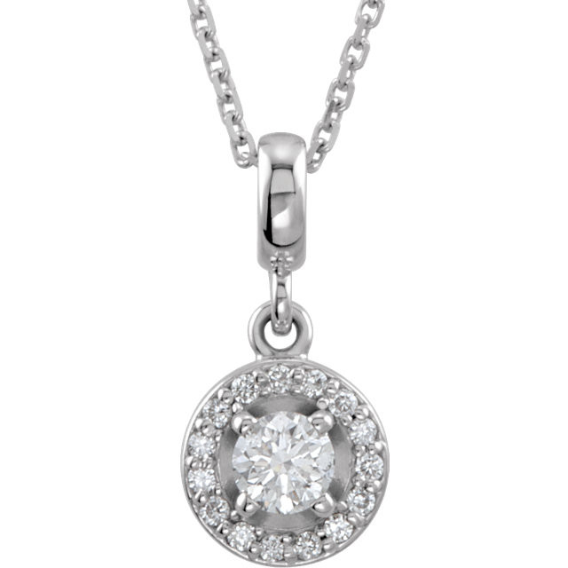 If you want to make a real entrance, don this dramatic diamond pendant necklace. All eyes will be on you and your jeweled d'colletage. You will be instantly transfixed into the one they all want to know even if they are not the actual guest of honor. Set in 14K white gold, this pendant weighs 1/4 ct. tw. and has a bright polish to shine.