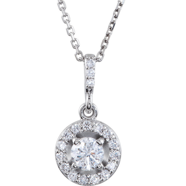 14 karat white gold diamond necklace featuring shimmering white diamonds which articulate beautifully. The total carat weight of white diamonds is 1.00 carat.