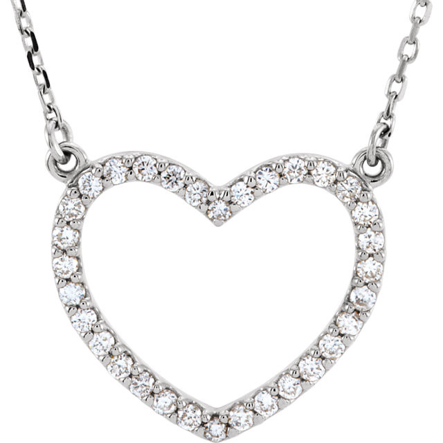 Beautiful 14Kt white gold heart necklace features white shimmering diamonds with 1/4 carats of diamonds hanging from a 16" inch chain which is included.