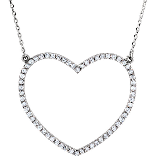 Beautiful 14Kt white gold heart necklace features white shimmering diamonds with 1/2 carats of diamonds hanging from a 16.5" inch chain which is included.