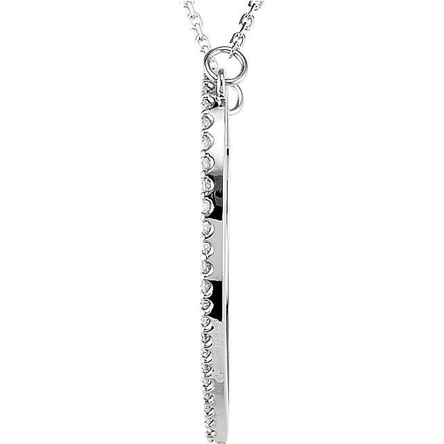 Beautiful 14Kt white gold heart necklace features white shimmering diamonds with 1/2 carats of diamonds hanging from a 16.5" inch chain which is included.