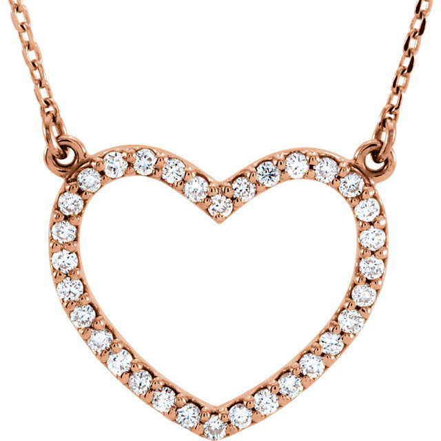 Beautiful 14Kt rose gold heart necklace features white shimmering diamonds with 1/4 carats of diamonds hanging from a 16.5" inch chain which is included.