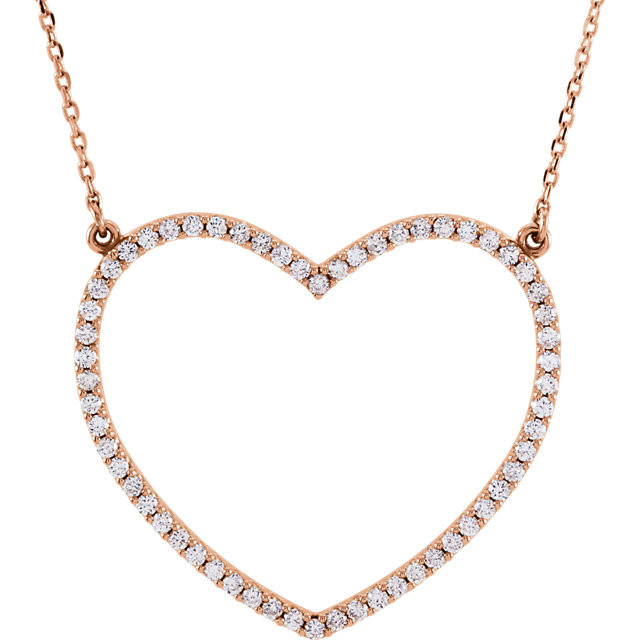 Beautiful 14Kt rose gold heart necklace features white shimmering diamonds with 1/2 carats of diamonds hanging from a 16.5" inch chain which is included.