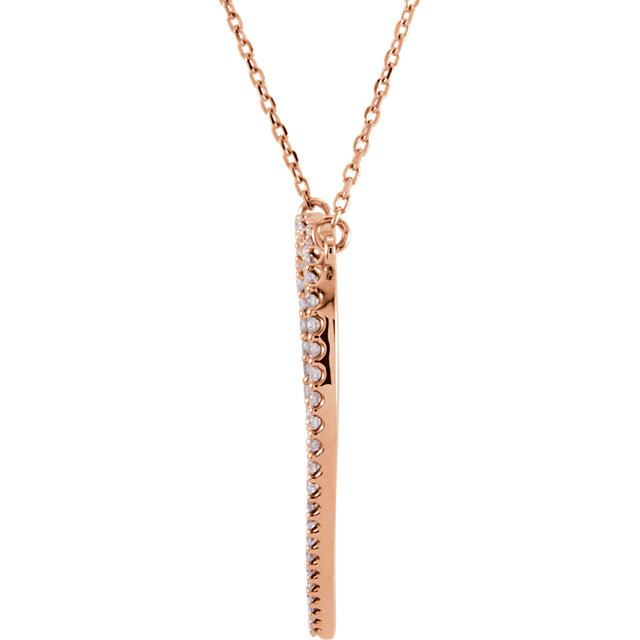 Beautiful 14Kt rose gold heart necklace features white shimmering diamonds with 1/2 carats of diamonds hanging from a 16.5" inch chain which is included.