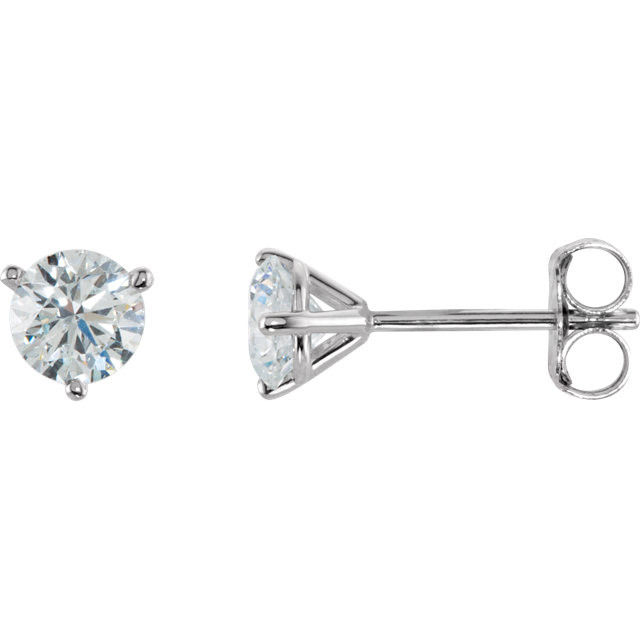 Brilliance is captured in these diamond stud earrings showcasing round diamonds in three-prong settings of 14k white gold. The pair amounts to a 3/4 carat total diamond weight.