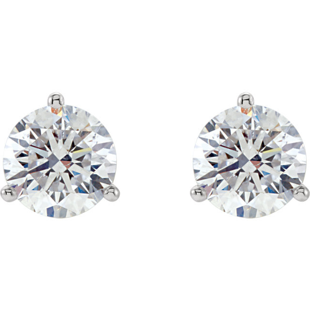 Brilliance is captured in these diamond stud earrings showcasing round diamonds in three-prong settings of 14k white gold. The pair amounts to a 1 1/2 carat total diamond weight.
