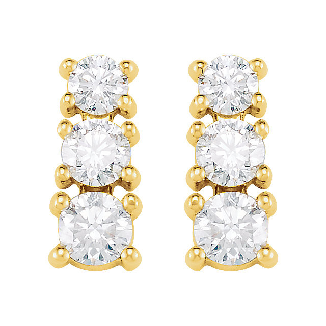 Bold and brilliant, these diamond 3 stone earrings are a sparkling look, perfect for that special evening out. Crafted in cool 14K yellow gold, each earring features three shimmering prong-set diamonds that are G-H in color and I1 or better in clarity. Radiant with 9/10 ct. t.w. of diamonds and polished to a brilliant shine, these post earrings secure comfortably with friction backs.