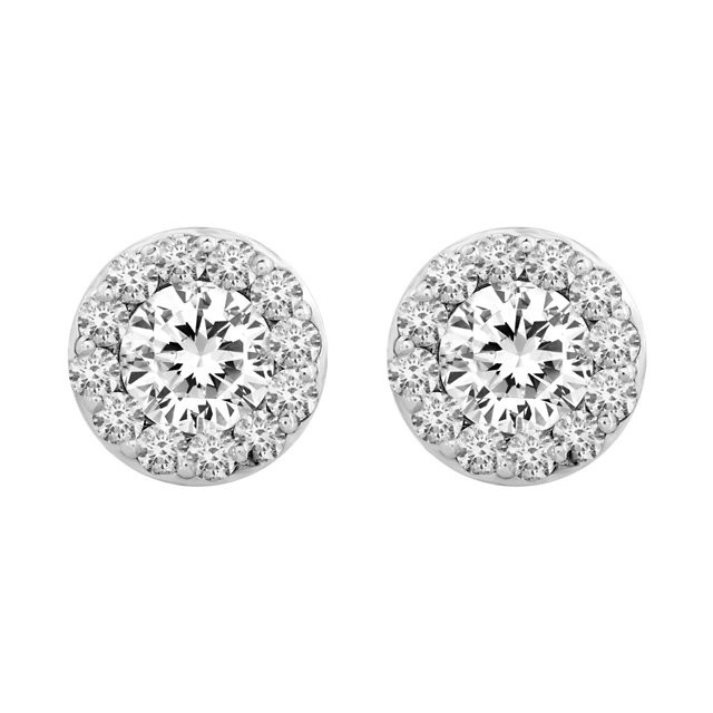 Exceptional brilliance of enormous proportions. Slightly domed to catch light from every direction, these diamond fantasy cluster earrings make a stunning impression at first and second glance.