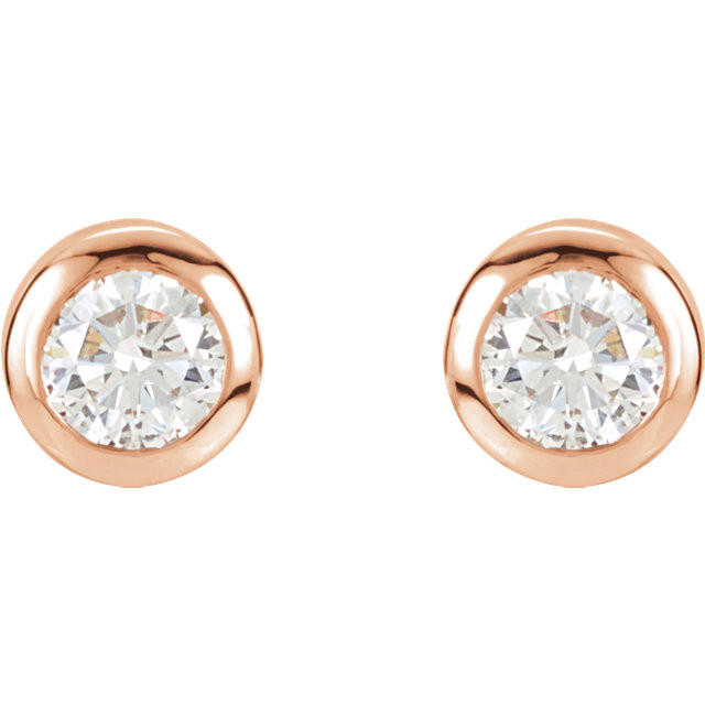 These are a beautiful pair sparking center diamonds in these lovely earrings. Crafted in romantic 14K rose gold, the earrings have a total diamond weight of 1.00 carat and are secured with friction backs. 