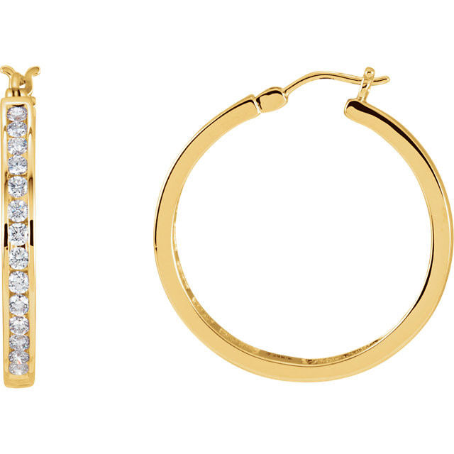 Elevate your look with a touch of sparkle. These unique diamond channel-set hoop earrings feature round-cut diamonds (1.00 ct. t.w.) in 14k yellow gold. Polished to a brilliant shine.