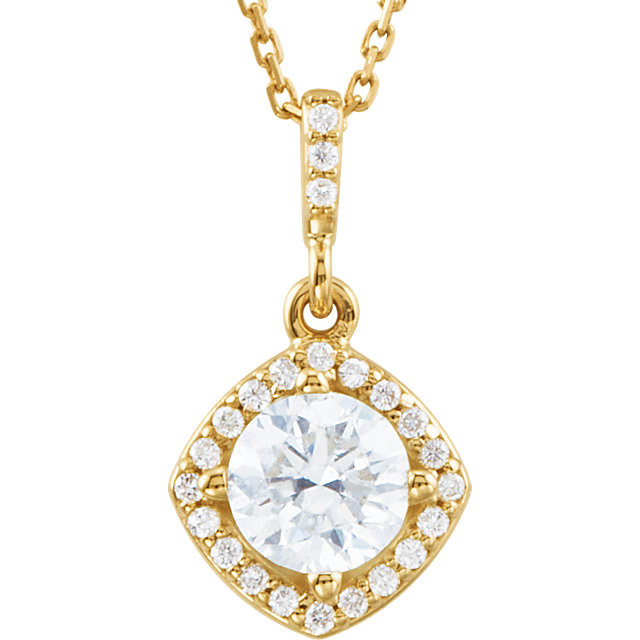 An impressive round diamond framed in additional round diamonds is the focal point of this extraordinary necklace for her. The pendant, fashioned in 14K yellow gold, is suspended from an 18-inch chain secured with a spring ring clasp. The total diamond weight is 7/8 carats.