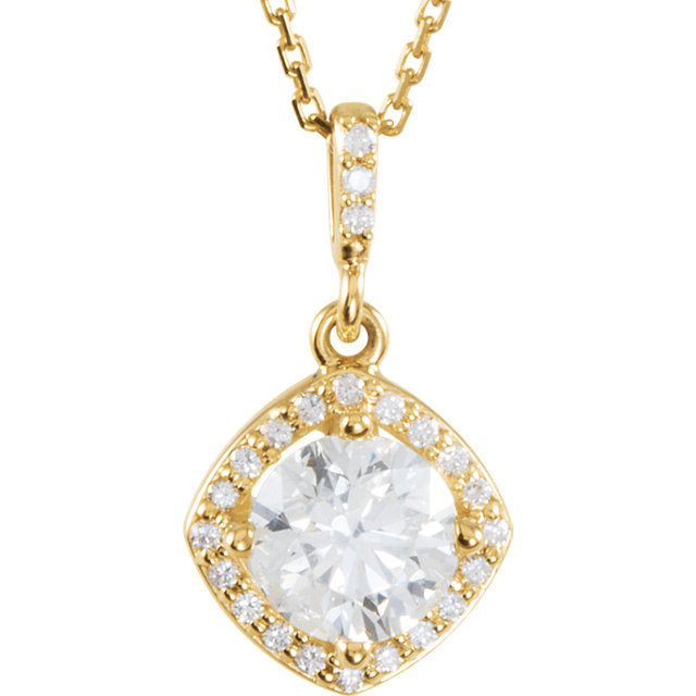 An impressive round diamond framed in additional round diamonds is the focal point of this extraordinary necklace for her. The pendant, fashioned in 14K yellow gold, is suspended from an 18-inch chain secured with a spring ring clasp. The total diamond weight is 1 1/6 carats.