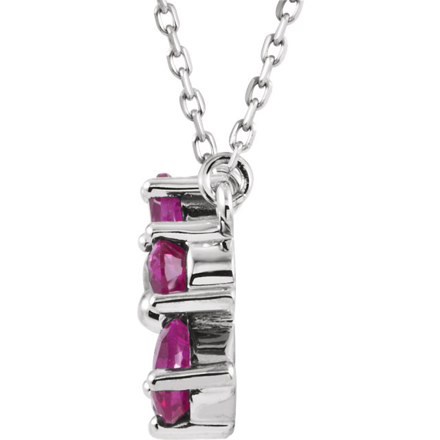 This 14k white gold necklace features an 05.00x03.00mm pear Created Pink Sapphire gemstone and has a bright polish to shine. An 16 inch 14k white gold solid diamond cut cable chain is included.