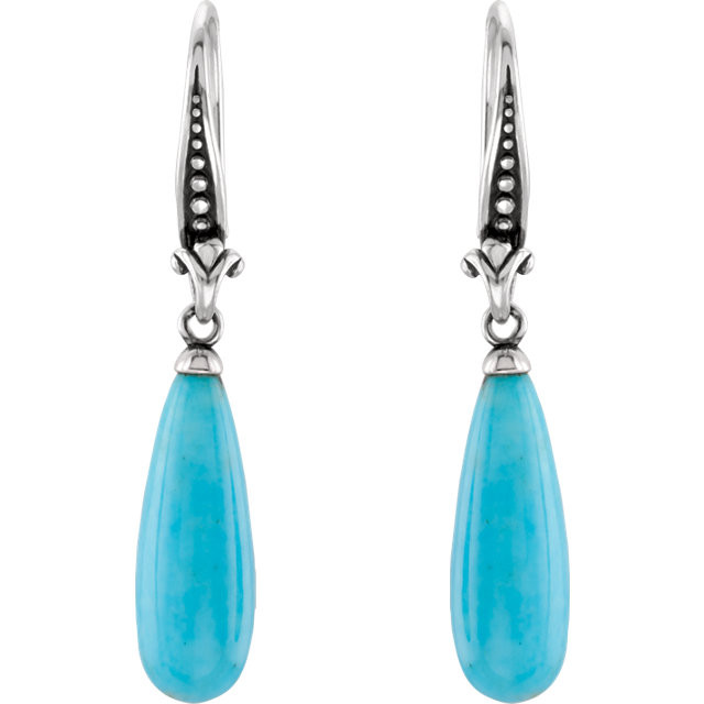 Wonderful sterling silver earrings with genuine turquoise 22 x 8mm in size and has a bright polish to shine.