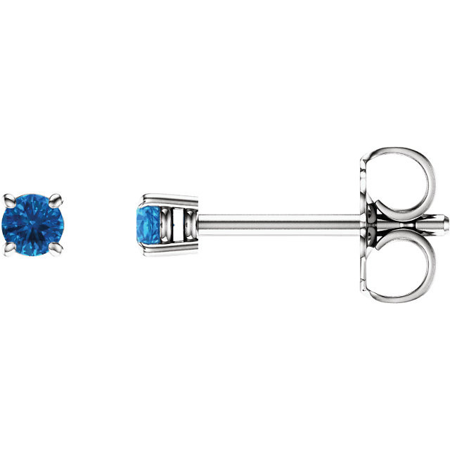 Delightfully colorful, these hand-selected gemstone earrings feature vibrant blue topaz gemstones complemented by 14k white gold four-prong settings. 