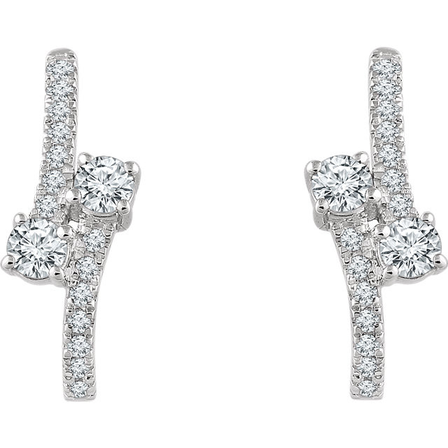 Celebrate your life together with these exquisite diamond J-hoop earrings. Crafted in 14K white gold, these meaningful designs each features two shimmering 1/6 ct. diamonds, representing both your friendship and loving commitment, nestled side-by-side at the center. A brilliant metaphor for your romantic love story, these earrings captivate with 5/8 ct. t.w. of diamonds and a bright polished shine. The earrings secure with friction backs.