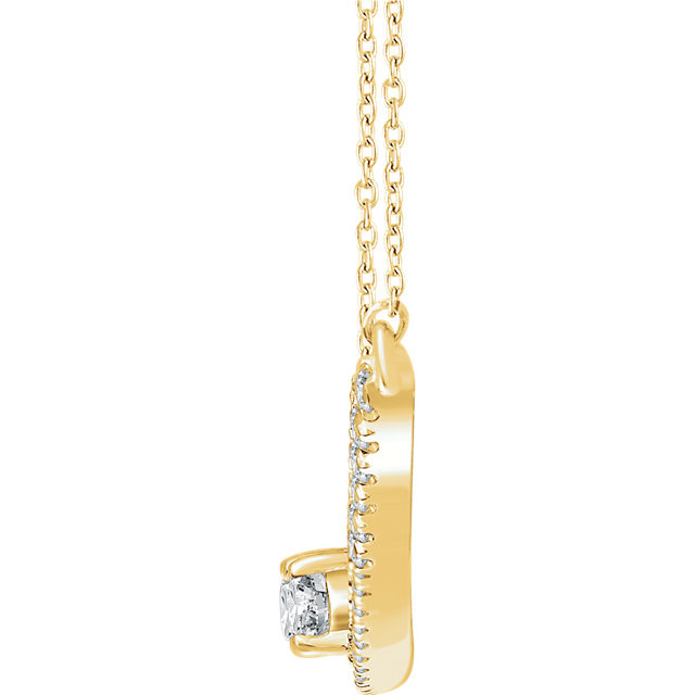 Chic and sparkling, this diamond two stone necklace features round diamonds in 14k yellow gold, and a matching cable chain. This necklace can be worn at 16 or 18 inches in length.