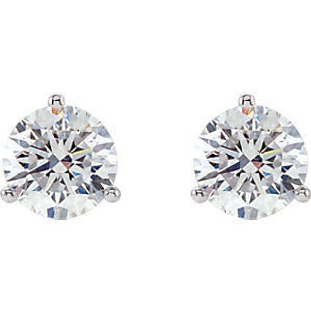 Beautifully matched, these diamond stud earrings feature round, full cut diamonds set in 14k white gold three-prong settings with friction backs.