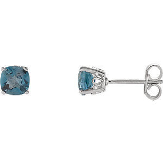 Cool blue in a no fuss, simple design define these London blue topaz stud earrings in 14k white gold. Polished to a brilliant shine.