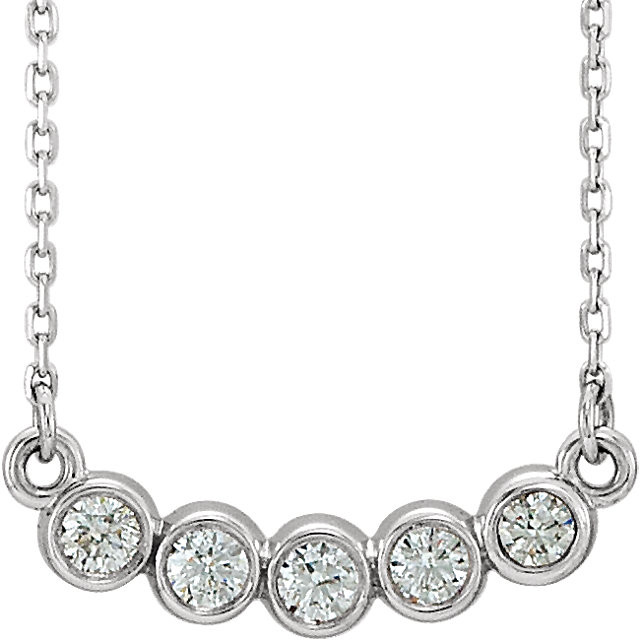 Beautiful Platinum bezel set 1/3 ct. tw. diamond necklace hanging from a 16-18" inch chain which is included.