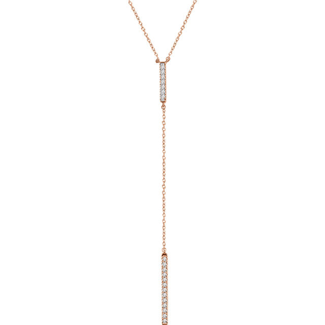 This alluring diamond bar "Y" necklace is striking. Set in 14kt rose gold with 20 shimmery diamonds weighing 1/5 ct tw, it is a perfect necklace for the perfect black dress. Don this knockout and all eyes will be on you.