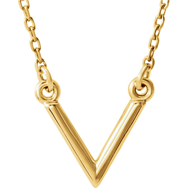 Stunning design is found in this 14Kt yellow gold "V" geometric pendant hanging from a 14Kt yellow gold necklace 16.50" inches in length. Total weight of the gold is 1.47 grams.