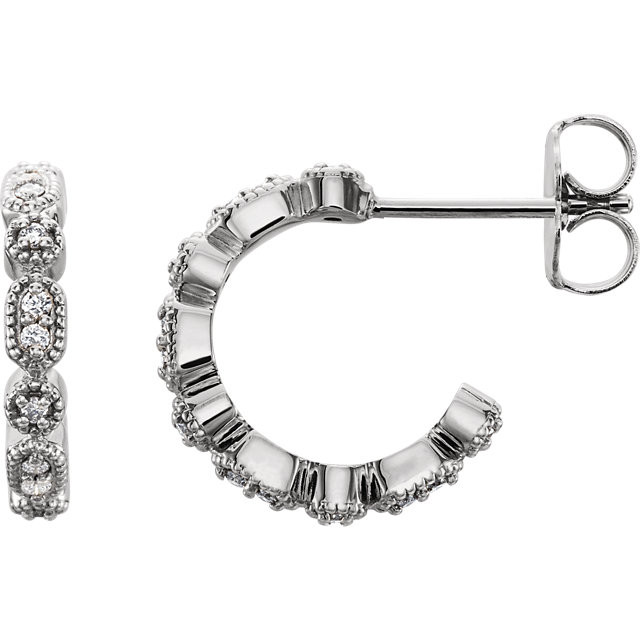 Superb style is found in these platinum Granulated J-Hoop earrings accented with the brilliance of round full cut diamonds. Total weight of the diamonds is 1/8 carats.