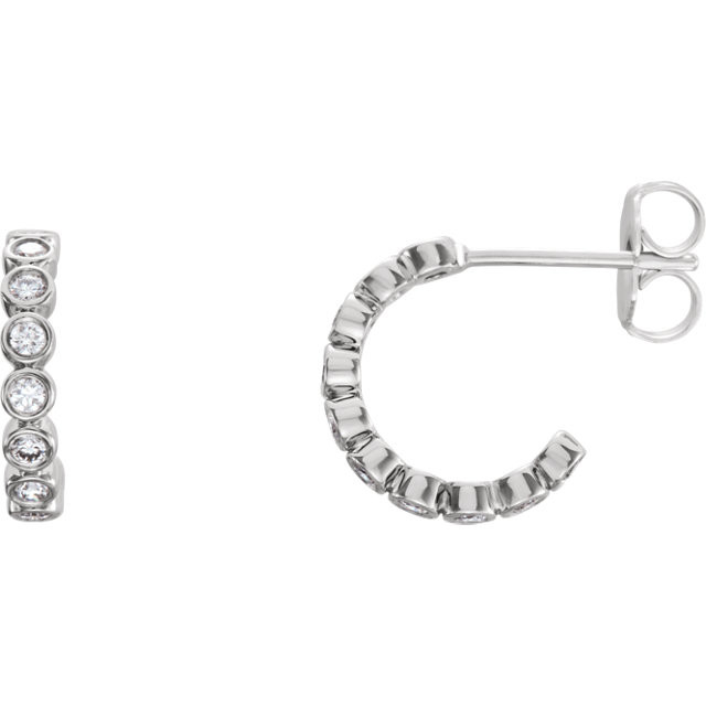 Perfect for a look of sheer elegance, these diamond bezel set hoop earrings feature gorgeous diamonds framed in striking Platinum.