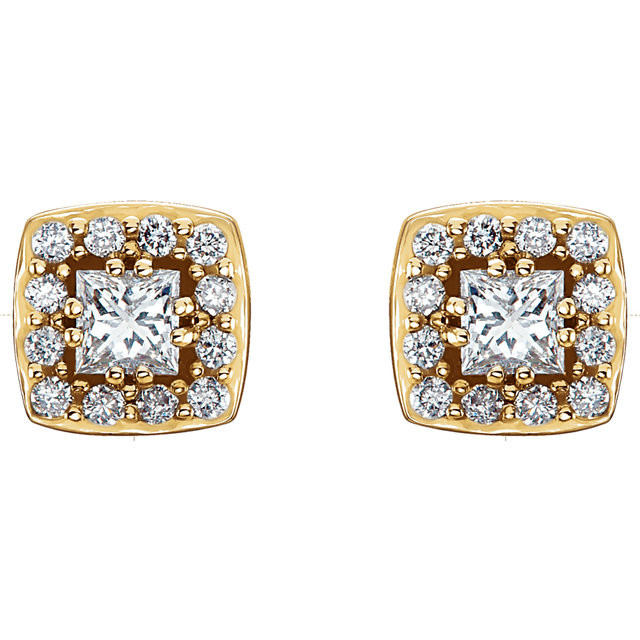 These exquisite diamond cluster stud earrings offer beauty equaled only to her own. Stunning in 14K white gold, these earrings feature 26 dazzling diamonds. Classic and elegant, these earrings captivate with 1/2 ct. t.w. of diamonds and a polished shine.