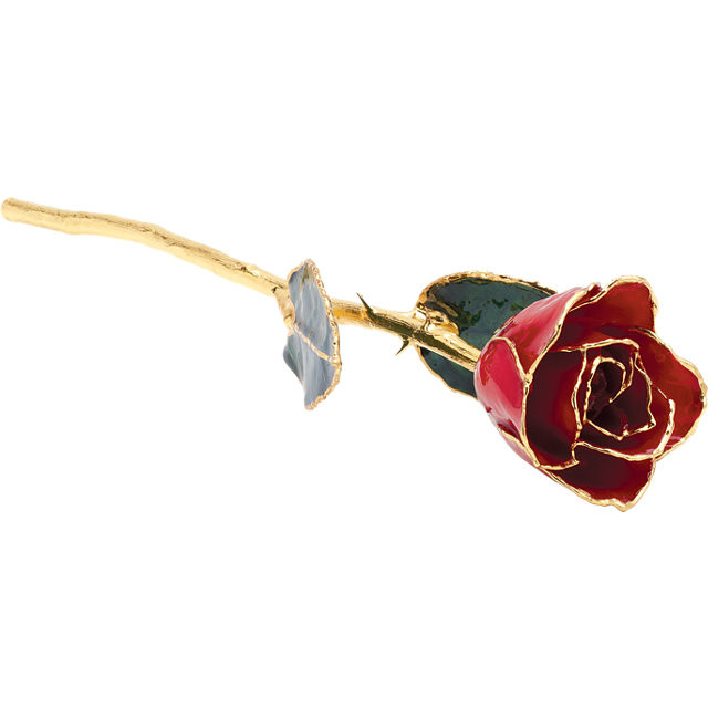 Real semi-opened rose petals dipped in lacquer and trimmed in 24kt gold. Stems are approximately 12" long and are gold plated. Each rose is elegantly wrapped in gold tissue and packaged in a gold, two-piece outer box. 