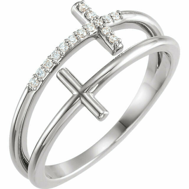 This sideways cross ring features 15 sparkling diamonds set in platinum.