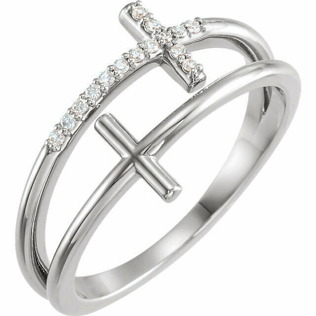 This sideways cross ring features 15 sparkling diamonds set in sterling silver.