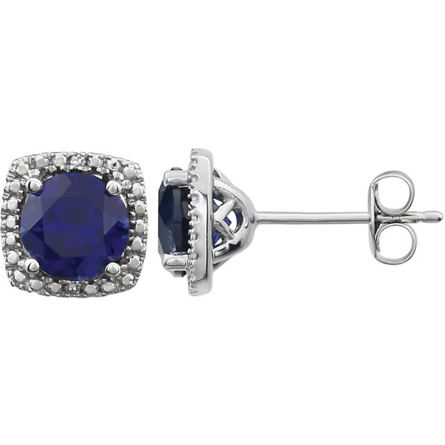 Beautiful sterling silver created blue sapphire september birthstone diamond earrings with .015 ct tw. Say "I love you" to any woman in your life; a friend, mother, wife, girlfriend, daughter. All earrings are sold in pairs. 