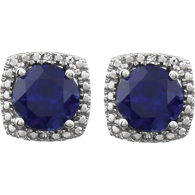 Beautiful sterling silver created blue sapphire september birthstone diamond earrings with .015 ct tw. Say "I love you" to any woman in your life; a friend, mother, wife, girlfriend, daughter. All earrings are sold in pairs. 