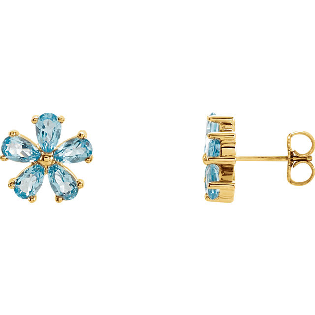 An alluring genuine Sky Blue Topaz makes a vibrant statement in each of these stylish earrings for her. Crafted in 14K yellow gold, These fine jewelry earrings are secured with friction backs. 