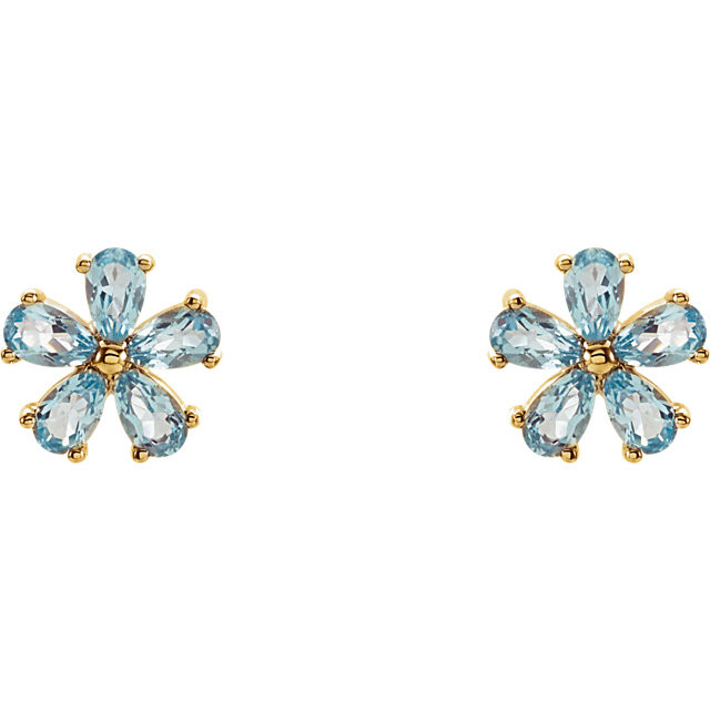 An alluring genuine Sky Blue Topaz makes a vibrant statement in each of these stylish earrings for her. Crafted in 14K yellow gold, These fine jewelry earrings are secured with friction backs. 
