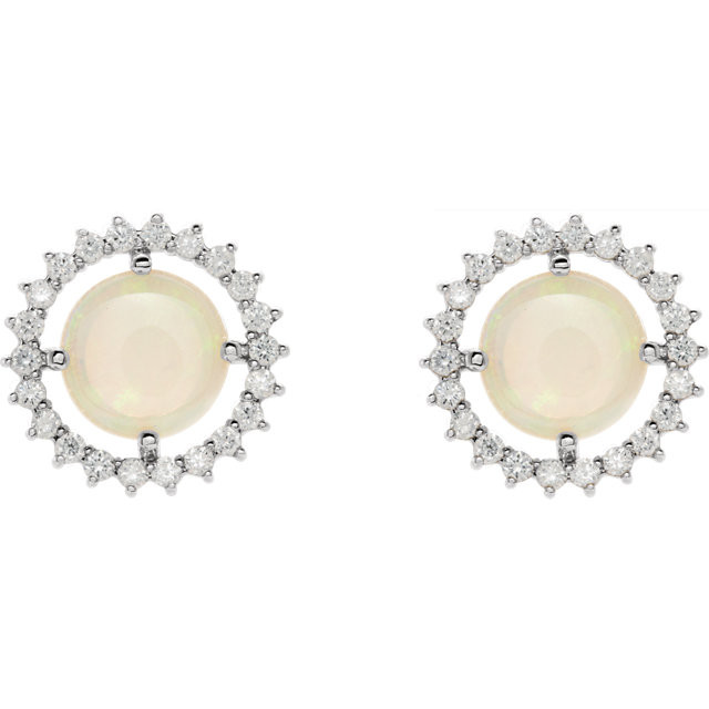 Exquisite 14Kt white gold earrings capturing the beauty of a round radiant genuine opal in each surrounded by white shimmering diamonds.