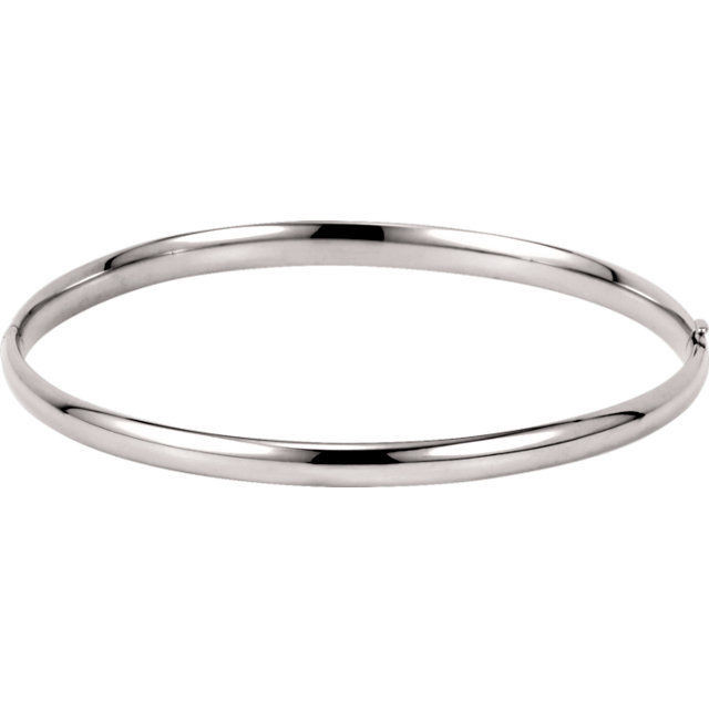 Crafted in brightly polished 14k white gold, this hollow, hinged bracelet is lightweight yet looks substantial. A statement piece on its own, stack with other bracelets for an on-trend look.