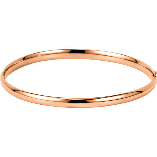 Crafted in brightly polished 14k rose gold, this hollow, hinged bracelet is lightweight yet looks substantial. A statement piece on its own, stack with other bracelets for an on-trend look.