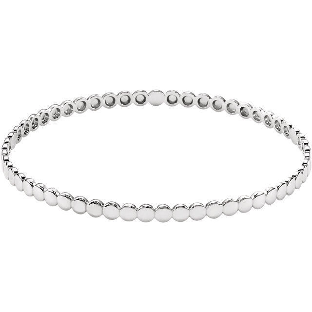 Add a touch of sparkle to your wrist with this elegant and beaded bangle bracelet.