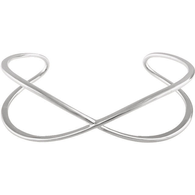 This criss cross cuff bangle bracelet is made of polished 14kt white gold.