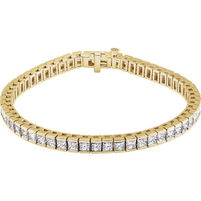 This fabulous 9 1/3 ct. t.w. diamond tennis bracelet is a breathtaking piece that we really love. Sparkling and sensational, it's a classic that features a stream of princess cut diamonds so gorgeous that it will have heads turning for a second look. 18kt yellow gold bracelet.