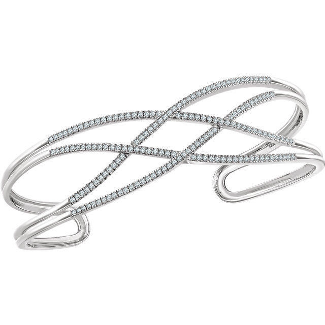 Diamond Cuff Bracelet in 14Kt white gold with 166 diamonds weighing 3/4 ct tw. Adds the perfect edge to a night out.