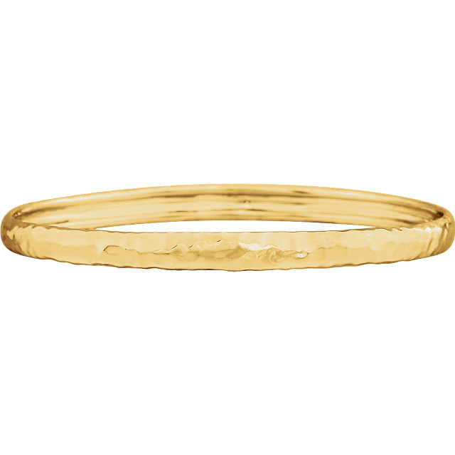 Organically elegant, this 14k yellow gold bangle bracelet is timeless and beautifully finished with a hammered texture. Perfect alone or stacked with other bracelets for an on-trend look.